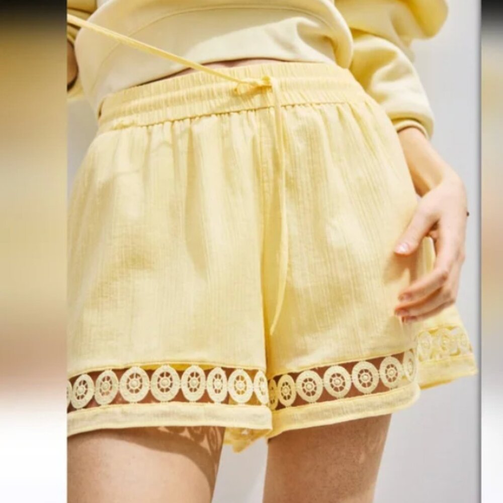 H&M High-Waisted Lace-Inset Drawstring Shorts in Butter Yellow